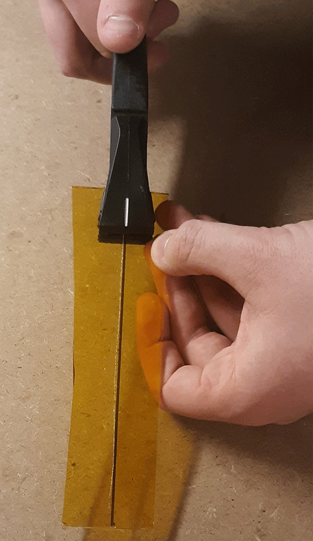 Breaking Out a Score Line on Glass Using a Score Running Pliers 