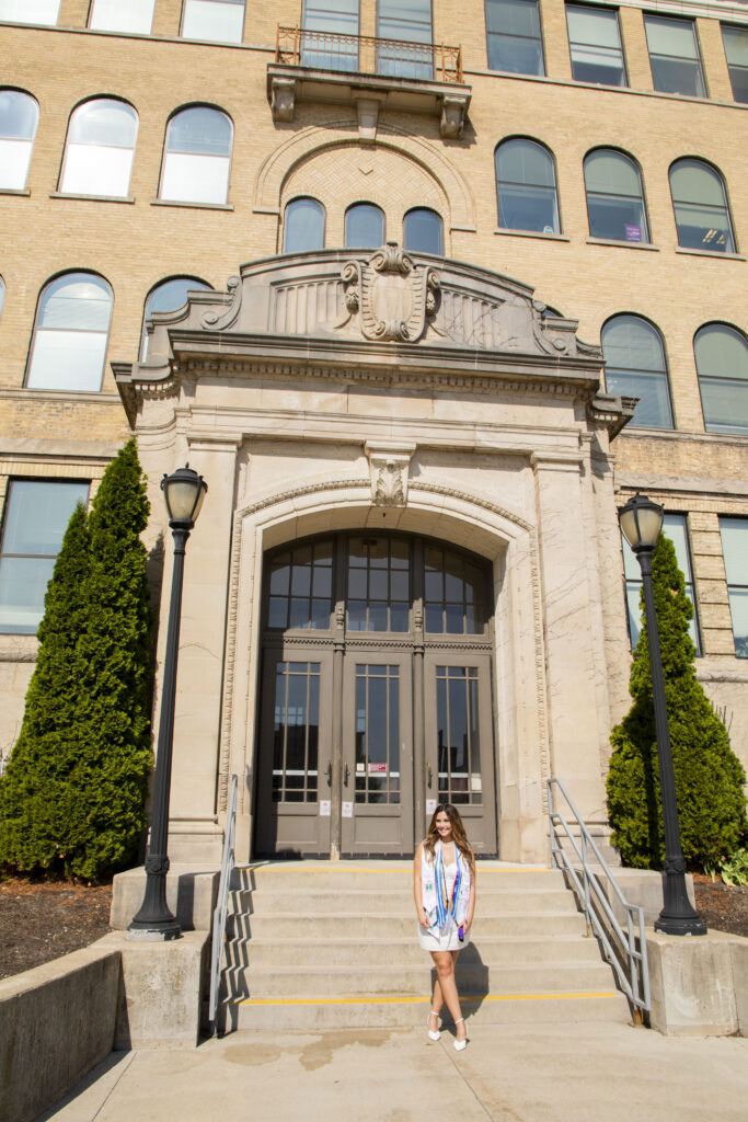 Student in front of Hyer Hall
